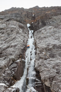 Climber doing ice climbing in Bodo, Nordland, Norway Climber doing ice climbing in Bodo, Nordland, Norway